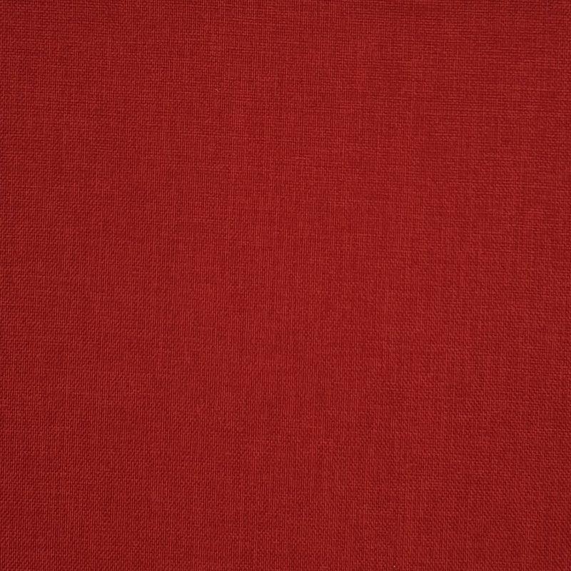 Primo piano di tessuto rosso a trama fitta per articoli tessili per la casa